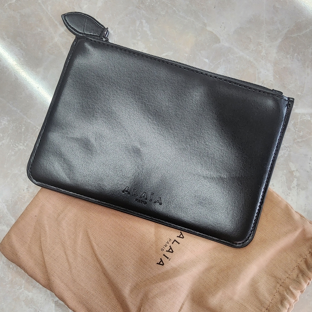 Alaia leather clutch